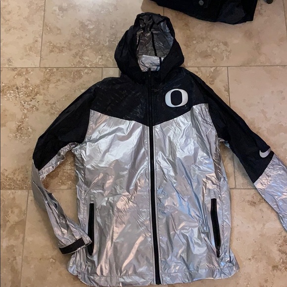 black and silver nike windbreaker